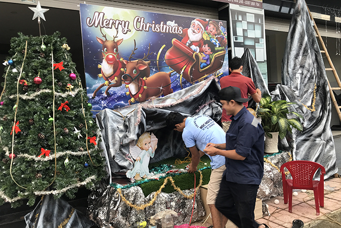 Setting up Nativity scene at a parish in Dien Khanh District