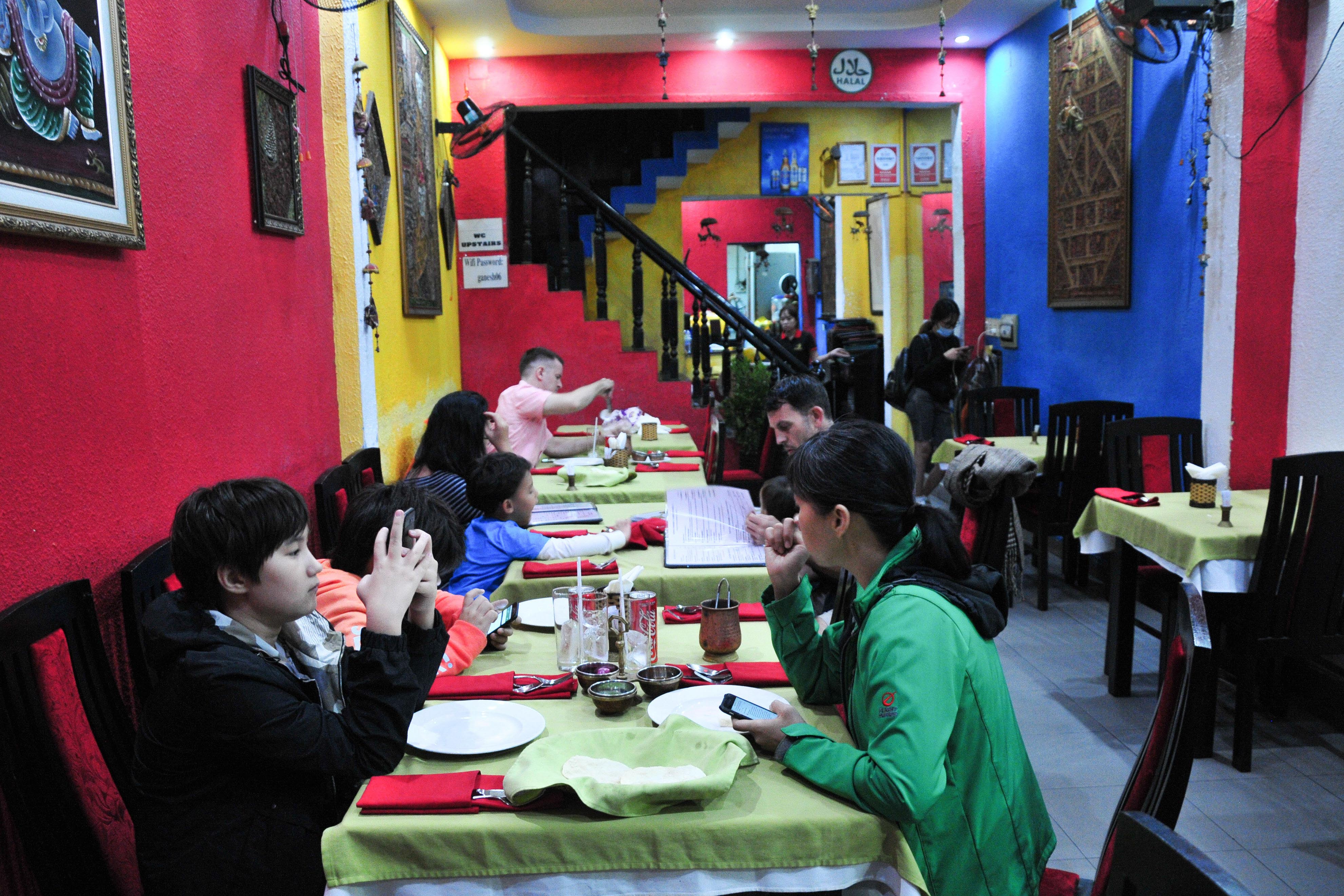 People having meal at a restaurant 