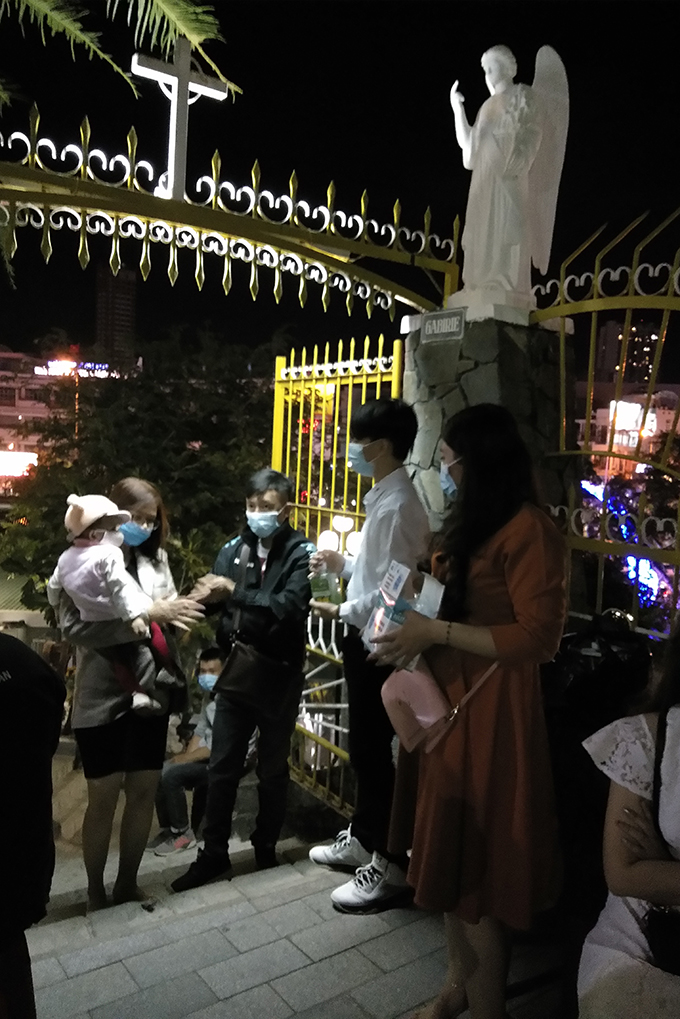 People in Nha Trang visiting religious facilities on Lunar New Year's Eve