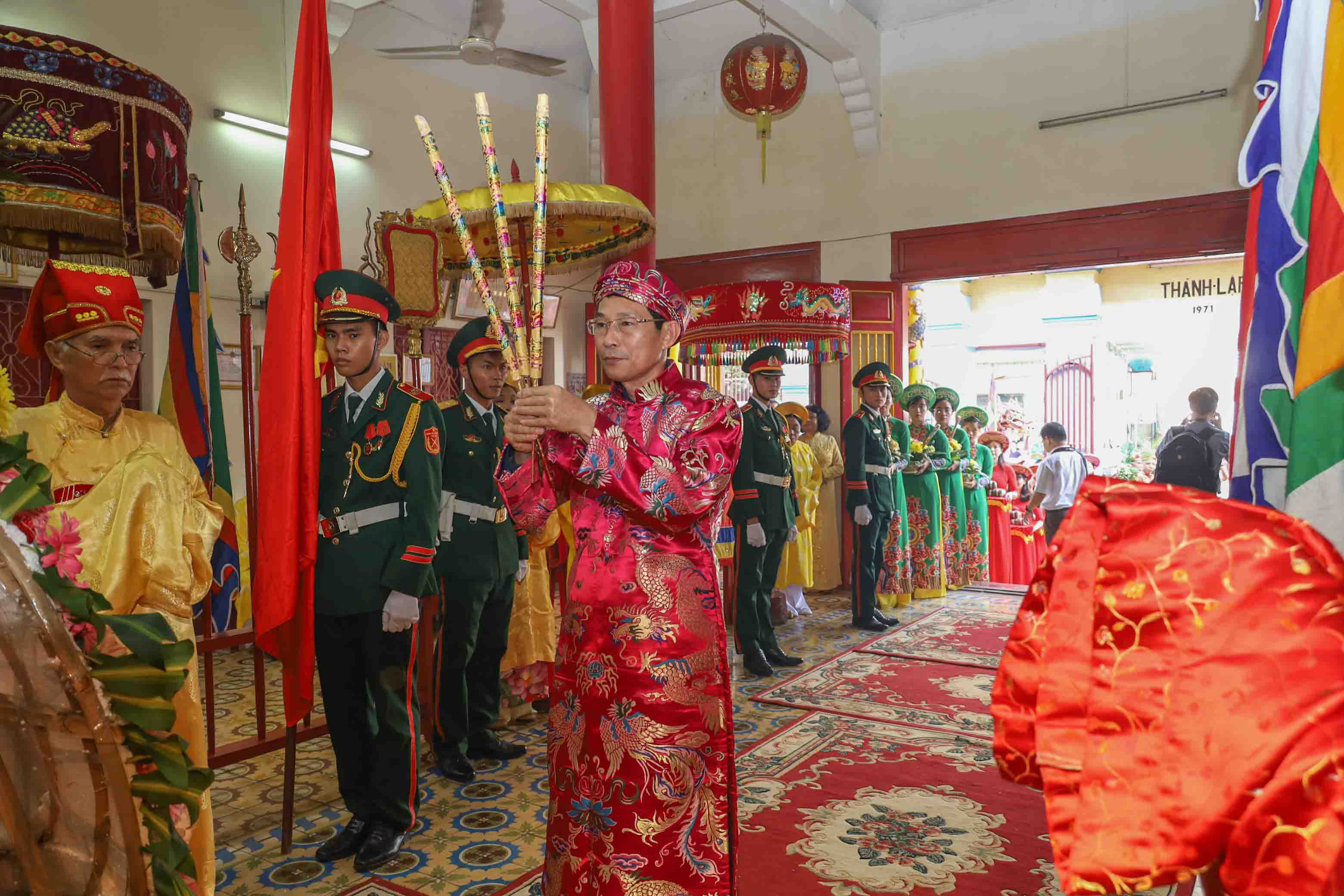 Dinh Van Thieu offers incense…