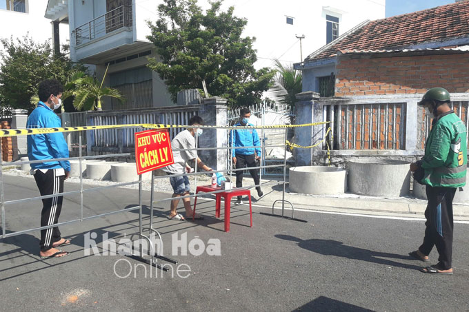 Youth Union members and youths of Van Gia Town at a checkpoint in a blockade area 