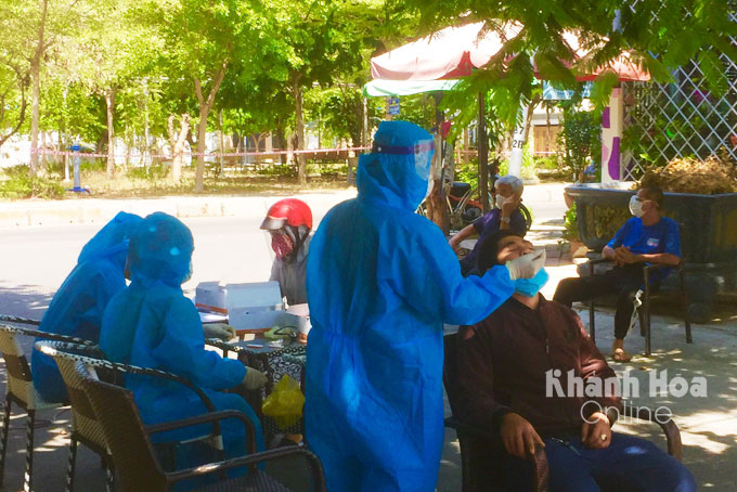 Taking samples for testing in Nha Trang City.