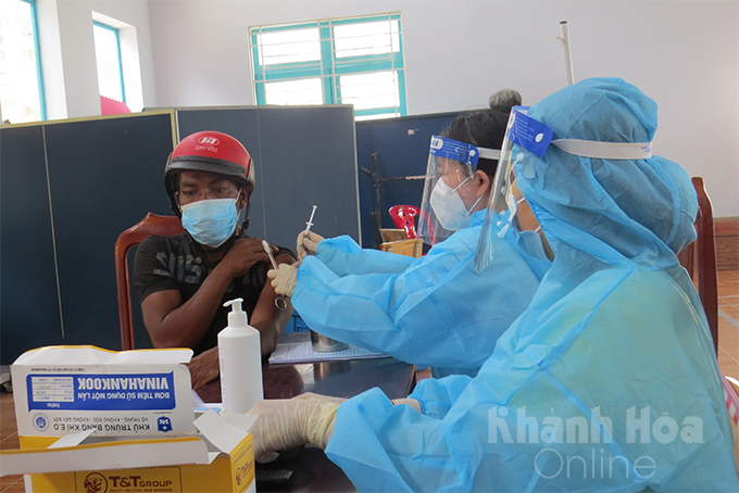 Getting vaccinated in Cam Lam District.