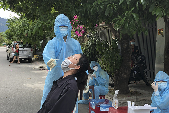 Taking sample for COVID-19 testing in Nha Trang