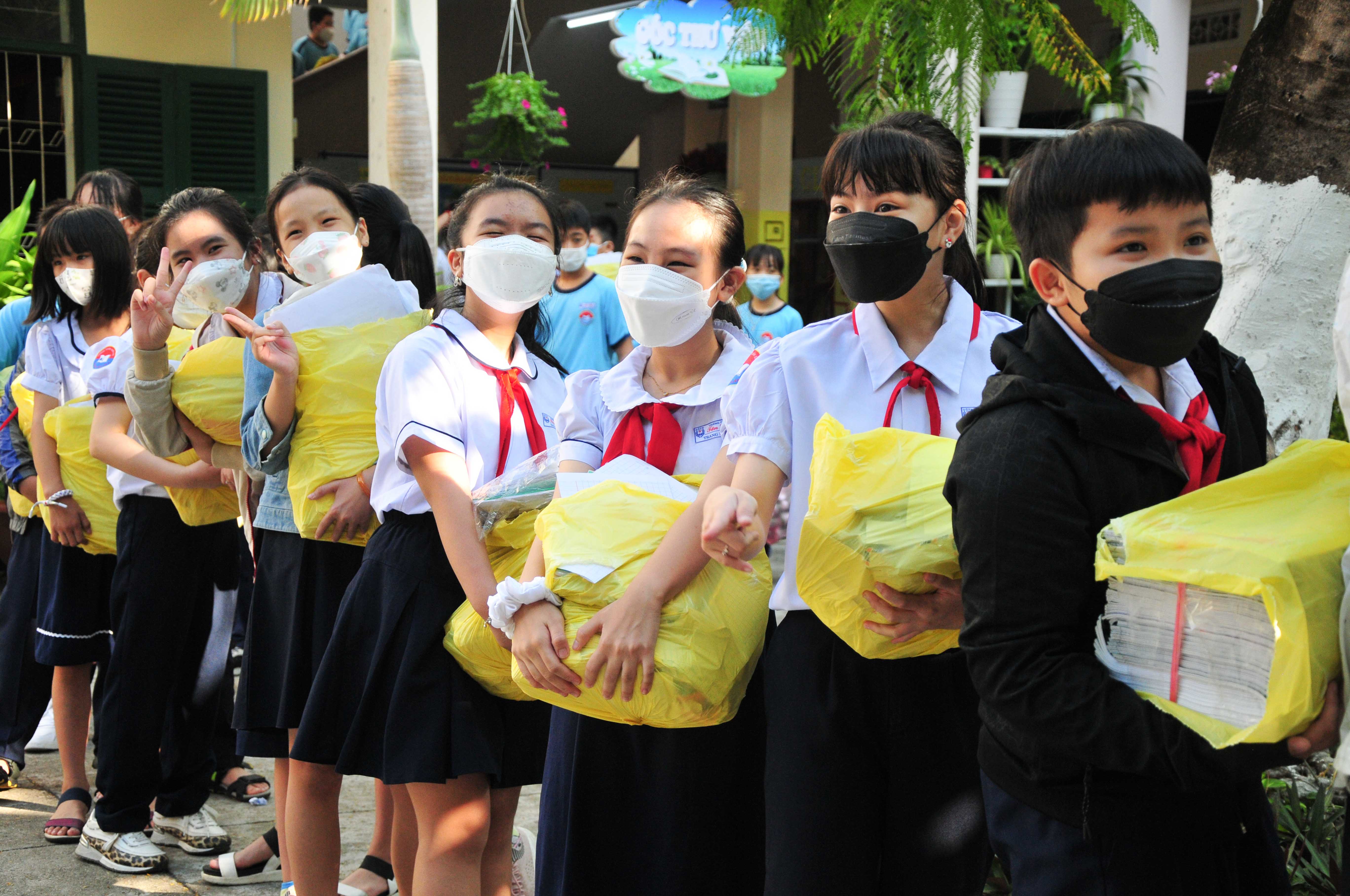 Tan Lap 2 Primary School students waiting to exchange garbage for plants