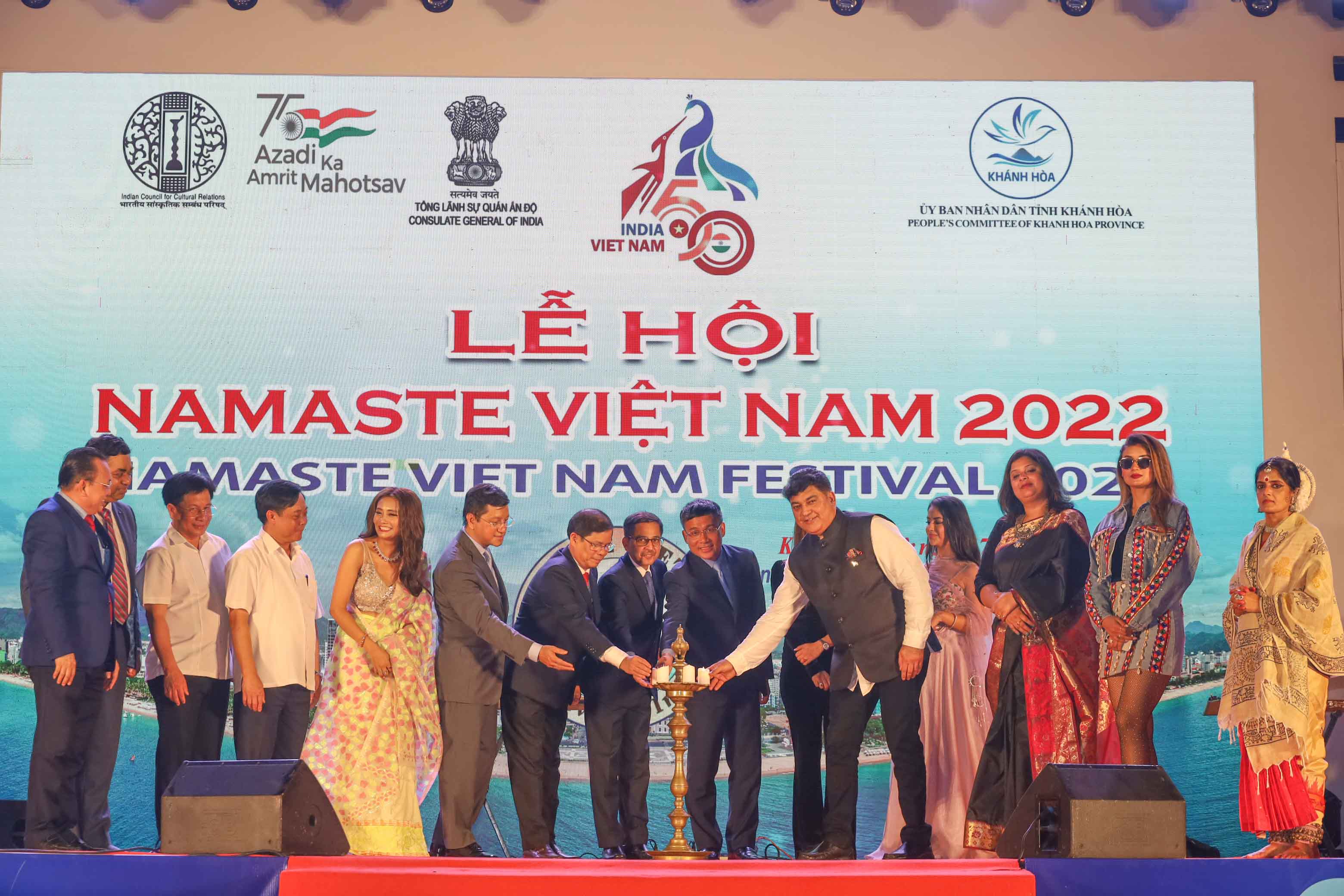 Representatives lighting lamp, a traditional ceremony of India