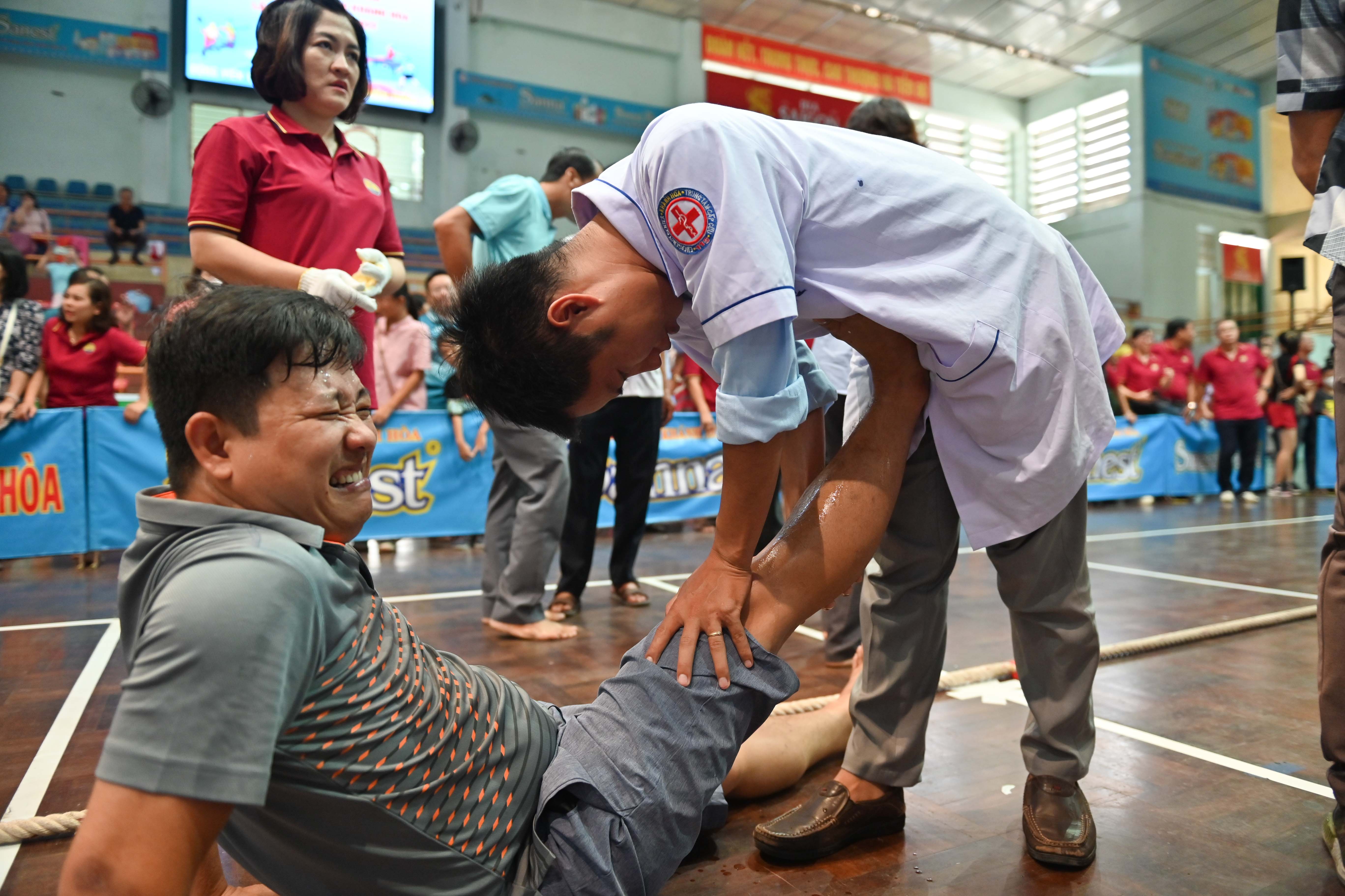 Medical staff treating an injured player 