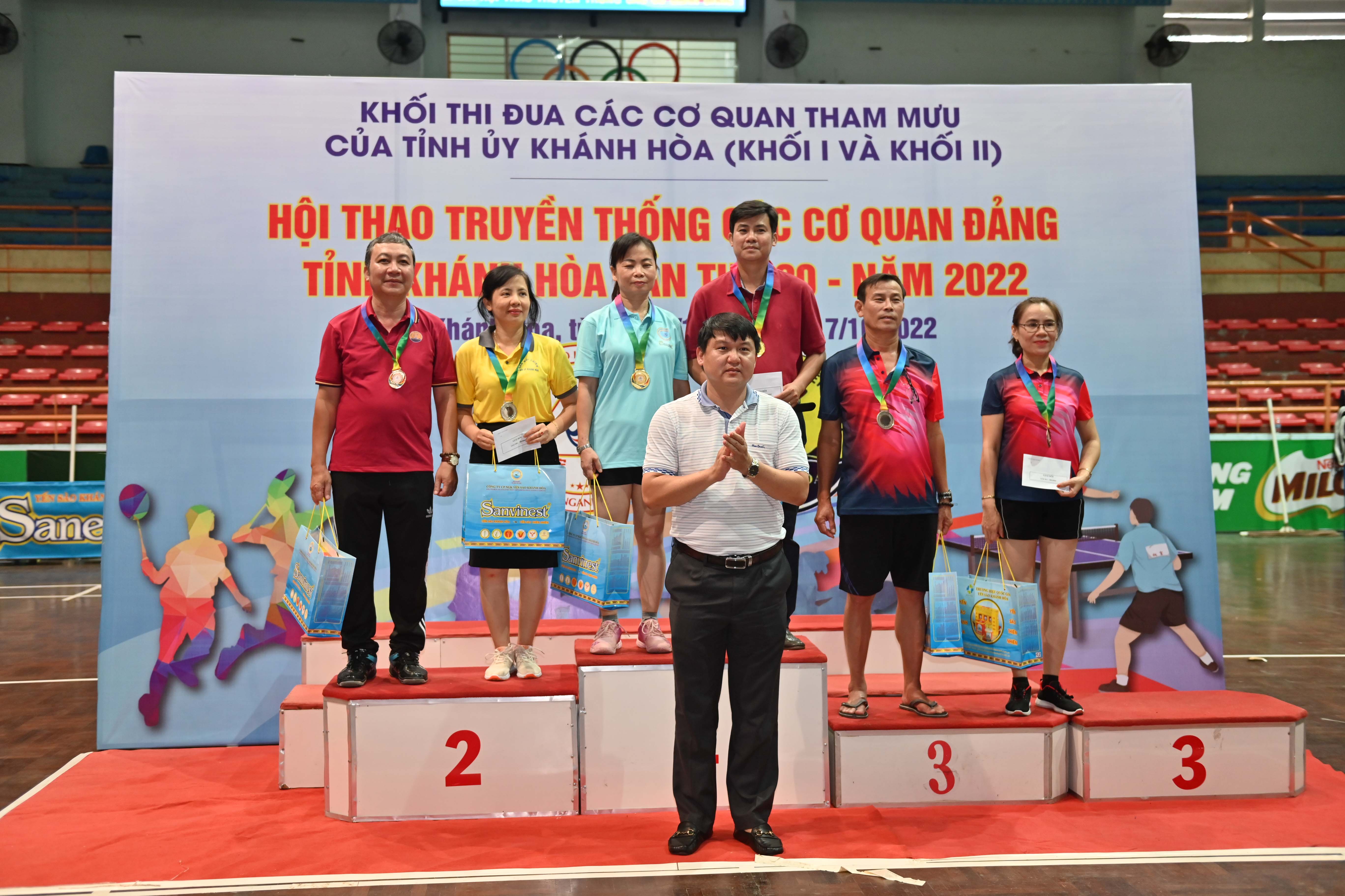 Winners of under-45 mixed doubles’ badminton