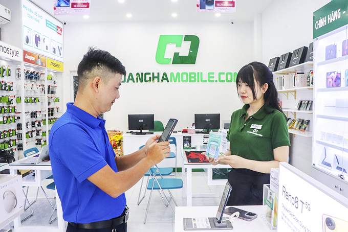 Customers paying via QR code at a store in Nha Trang